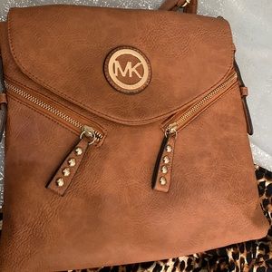 Purse leather brown MK 12 long by 12 wide good condition